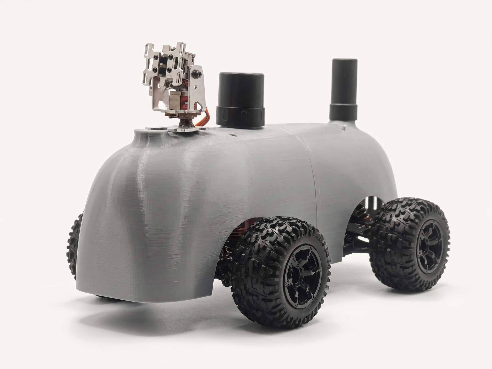 Nano Franky in the studio — grey shell, camera gimbal and antenna up.